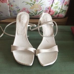 White Nine West heels.