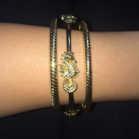 Three designer bracelets