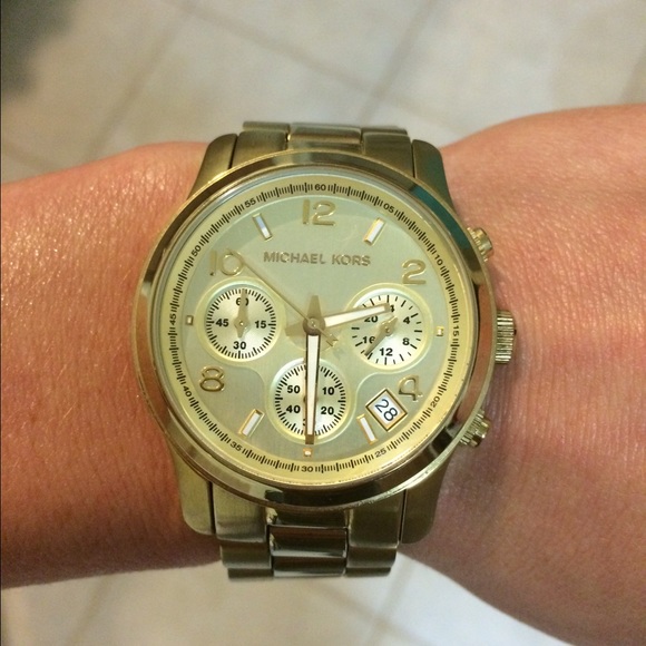 Gold Micheal Kors women's Boyfriend watch.