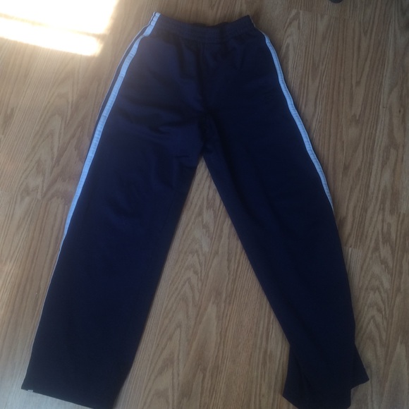 Navy blue and white striped sweat pants. Kids