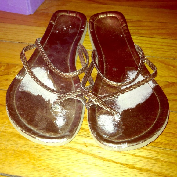 Gold braided flip flops