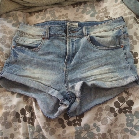 Mid - high waisted shorts , denim