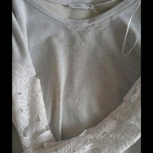 white long sleeve with flower design