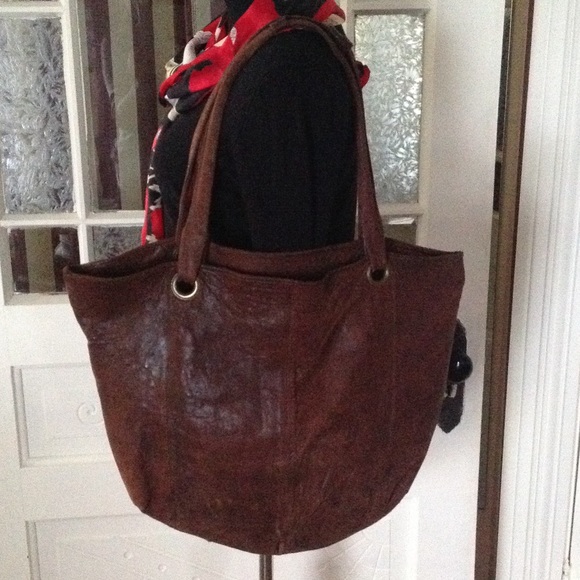 Large distressed leather hobo bag