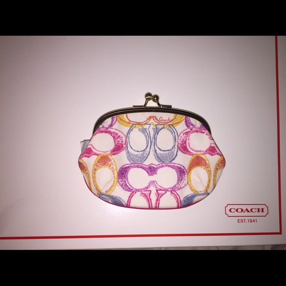 Authentic Coach coin purse NWT. Scribble