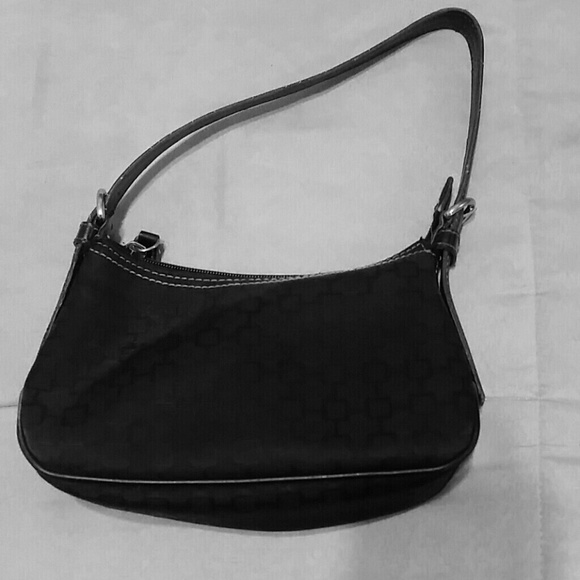 A small black hand bag