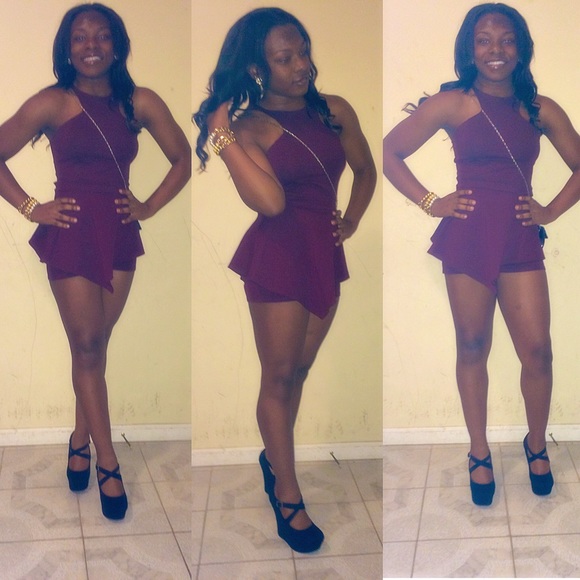 AKIRA Peplum Romper in wine color