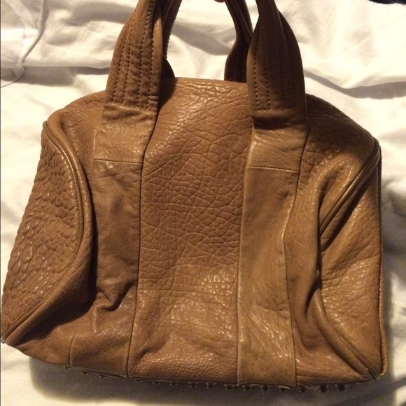 Taupe leather bottom studded bag