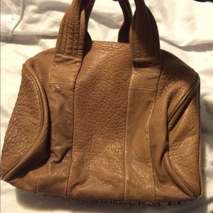 Taupe leather bottom studded bag