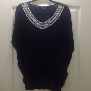 Black and silver sequined top