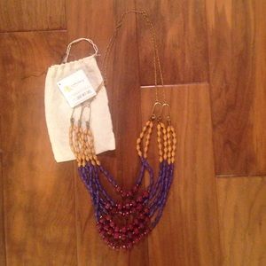 Beaded Noonday multi strand necklace.
