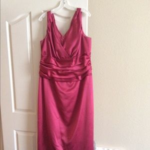 This is a David Bridal dress. Has been worn 1 time