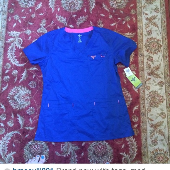Brand new scrub top with tags