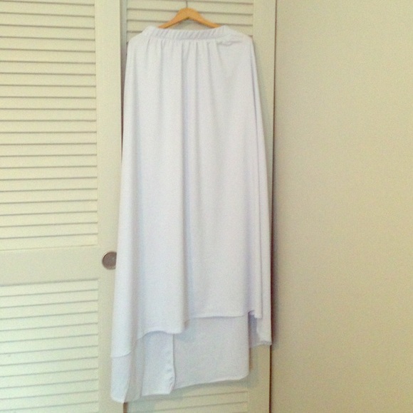 white maxi skirt with high low hem.