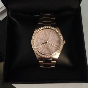 Rose gold Guess watch