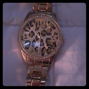 Gold cheetah watch