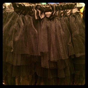 Cute tutu skirt. Silk waist band. Never been worn.
