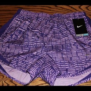 Purple patterned Nike shorts