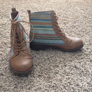 pair of black poppy booties