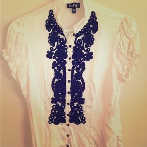 Ivory silk-blend Bebe blouse with Black embroidery