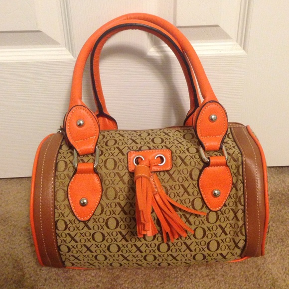 Xoxo orange and tan purse