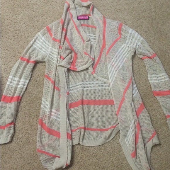 Brand called Say What. Pink and tan sweater