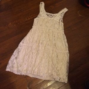 Short off white lace dress.