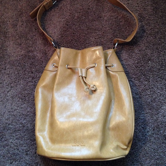 Beijo hobo bag. Tan color and silver hardware.