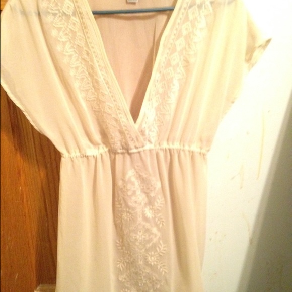 Sheer light tan shirt
