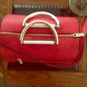 Very Cute red Oval bag with handle & straps new !!