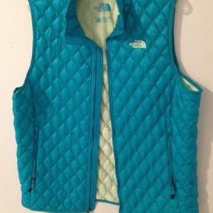 North Face teal and lime green puffy vest