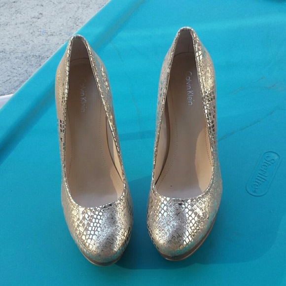 Gold Calvin Klein ,used one time, no box.