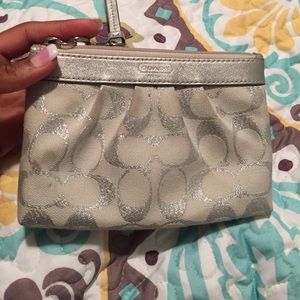 Authentic silver coach clutch