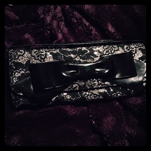 sexy silver glitter evening clutch with big bow