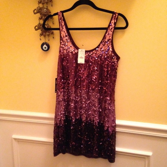 Brand New Sequin Express Dress.