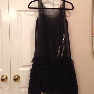 A Betsey Johnson cocktail dress. Never worn.