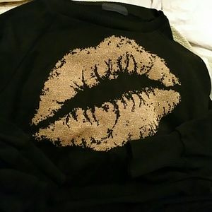 Black and gold "smooch" sweater