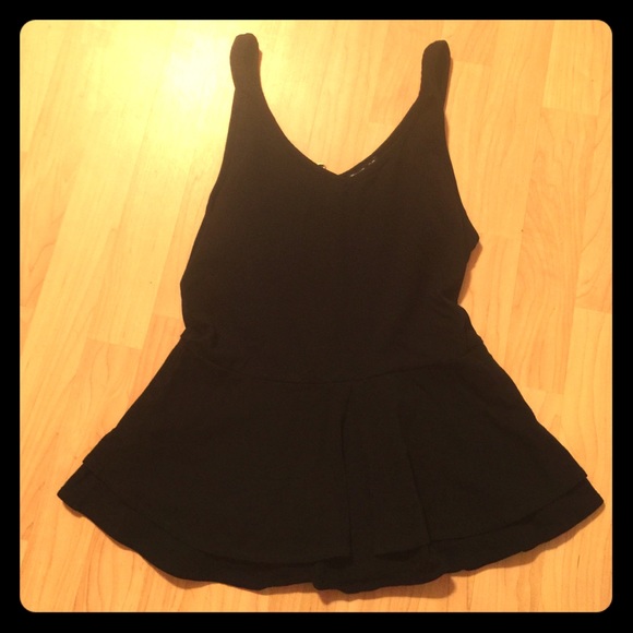 Black peplum tank with zip back closure