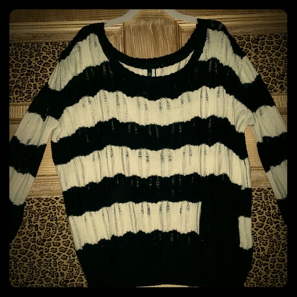 Stripped sweater/top sleeves up to elbows