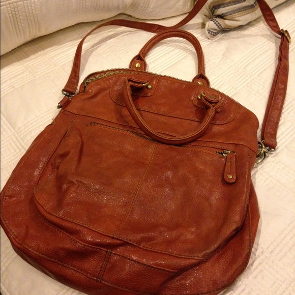 Cognac color hand bag with cross body strap