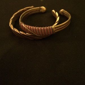 Two Gold Braclets.