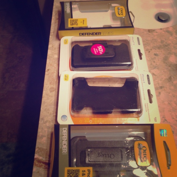 4 otterbox holster. 1 for iphone 4. Other 3 for 5