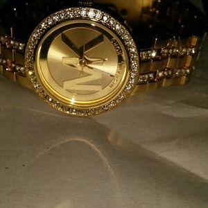 Sold sold Mk Watch gold