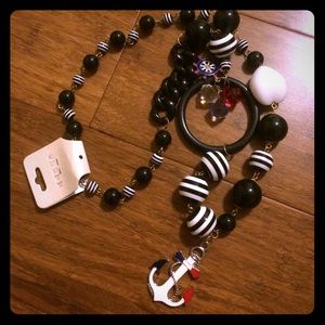 Necklace: Navy/pirates related.