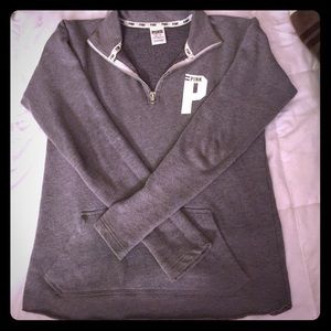 VS pink. Grey half zip pullover.