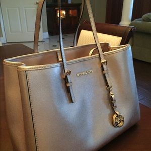 Michael kors gold metallic bag