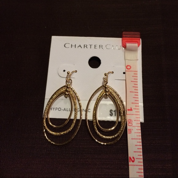 Gold color earrings oval design .sold