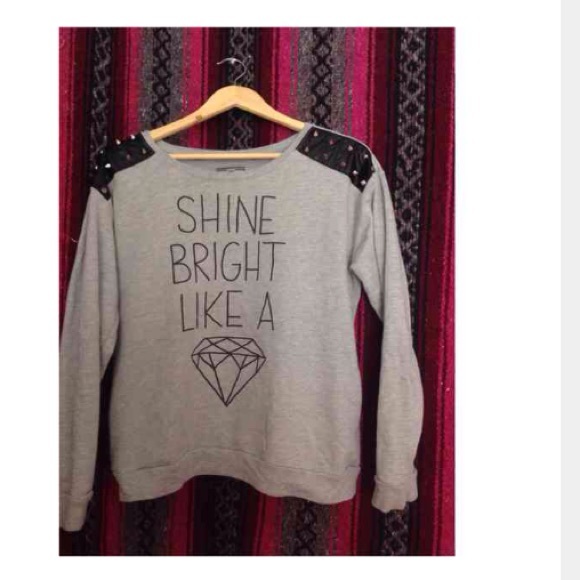 Spiked on shoulders shine bright sweater