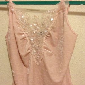 Beautiful detail blouse is m but fits like a small