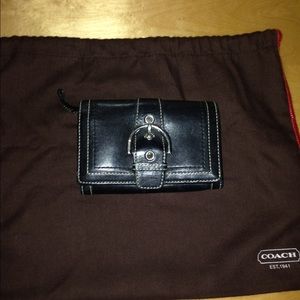 Black leather coach wallet.